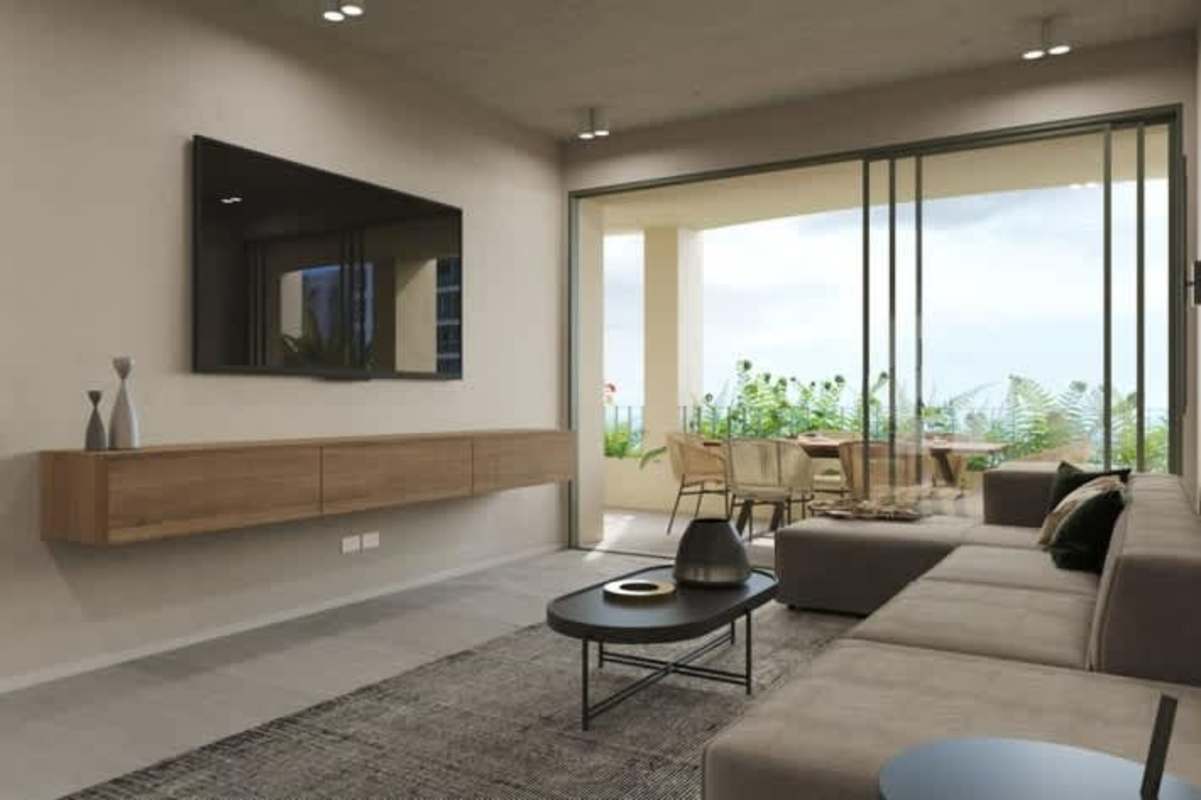 Living room with sliding doors to terrace balcony in PH A19 Coco del Mar Panama City