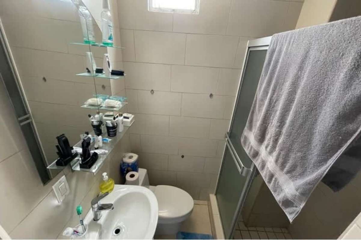 Covered balcony with outdoor seating in PH Albrook Point apartment Ancón Panama