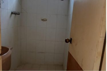 Unfurnished bedroom with louvered windows tile floor in house for sale Brisas de Arraiján