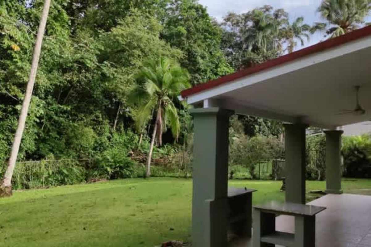 Inviting swimming pool set in lush garden luxury property Clayton Panama