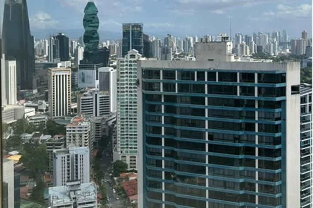 Skyline of Panama City with iconic twist tower and Pacific Ocean view