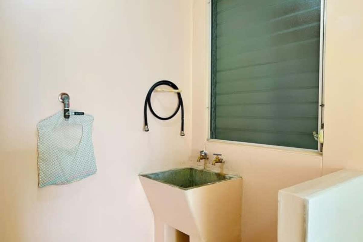 Empty bedroom with white sliding closet doors and tiled floor for rent in Residencial Río Abajo Panama City