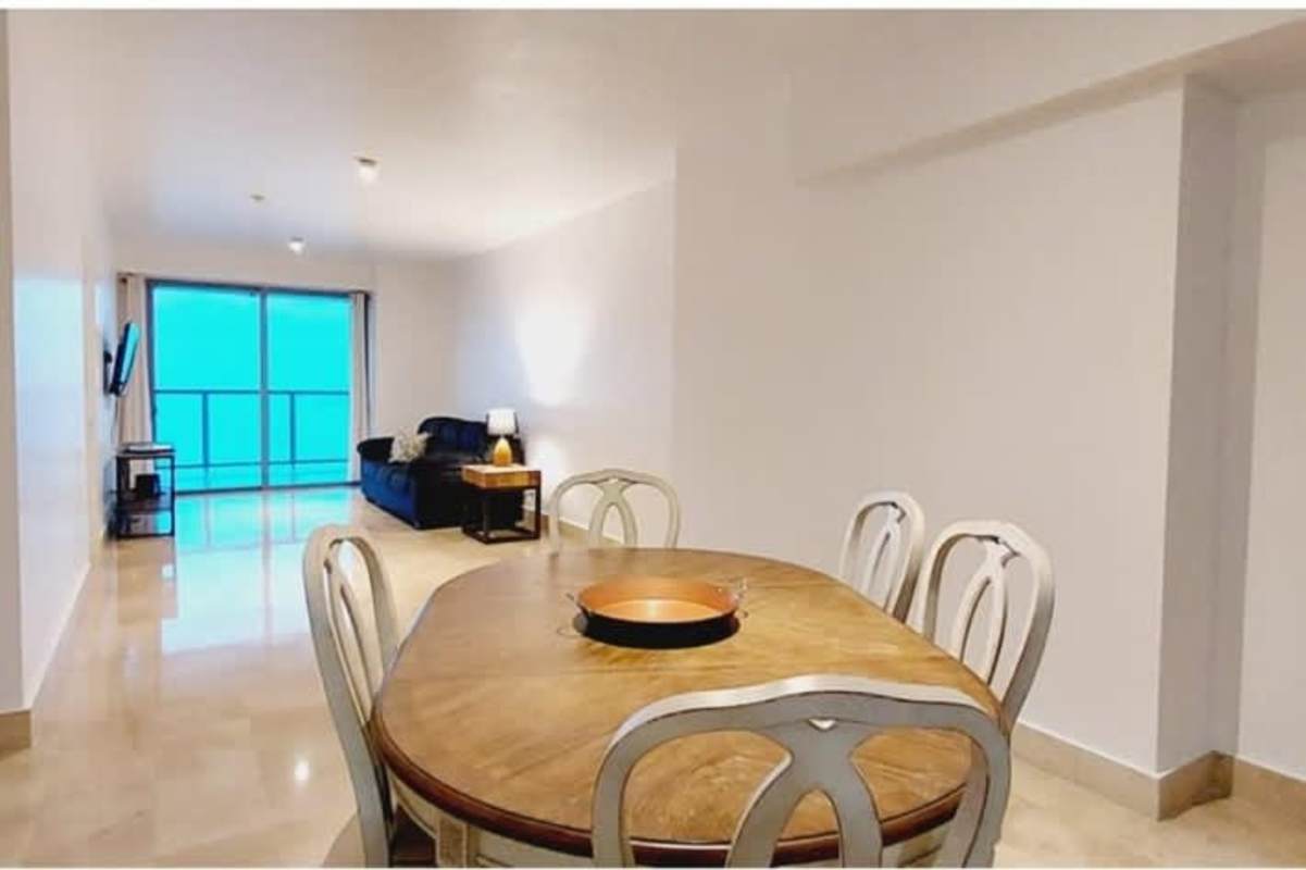 Open plan living dining room with balcony ocean views luxury apartment PH BICSA Panama