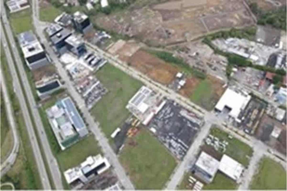 Aerial image of Santa María Business District with adjacent Corredor Sur highway and commercial buildings