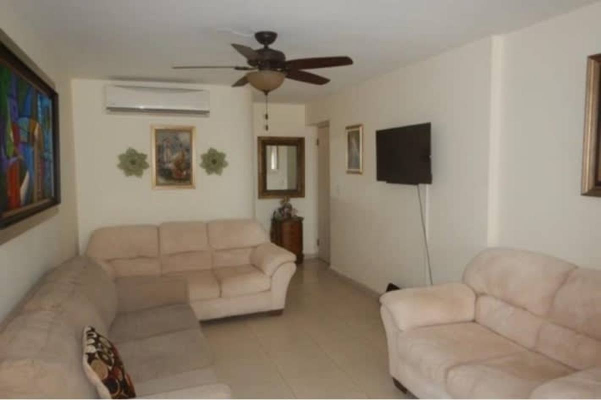 Large living dining area with windows, ceiling fan and tiled floors in PH Dos Mares View 1 Betania Panama