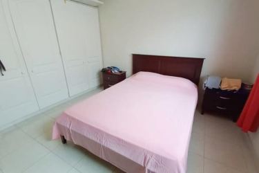 Living and dining area with large windows in house at Colinas del Sol Arraiján Panama Oeste