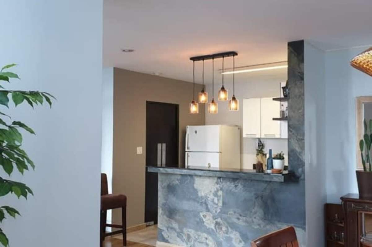 Open plan living dining area modern furnishings balcony view PH BICSA Tower Panama