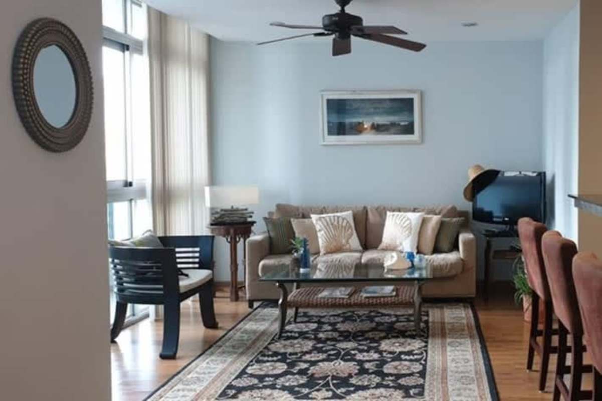 Bedroom featuring ocean and city skyline view glass windows PH BICSA Tower Panama