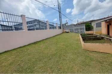 Covered outdoor patio and green backyard at commercial residential property La Chorrera Panama