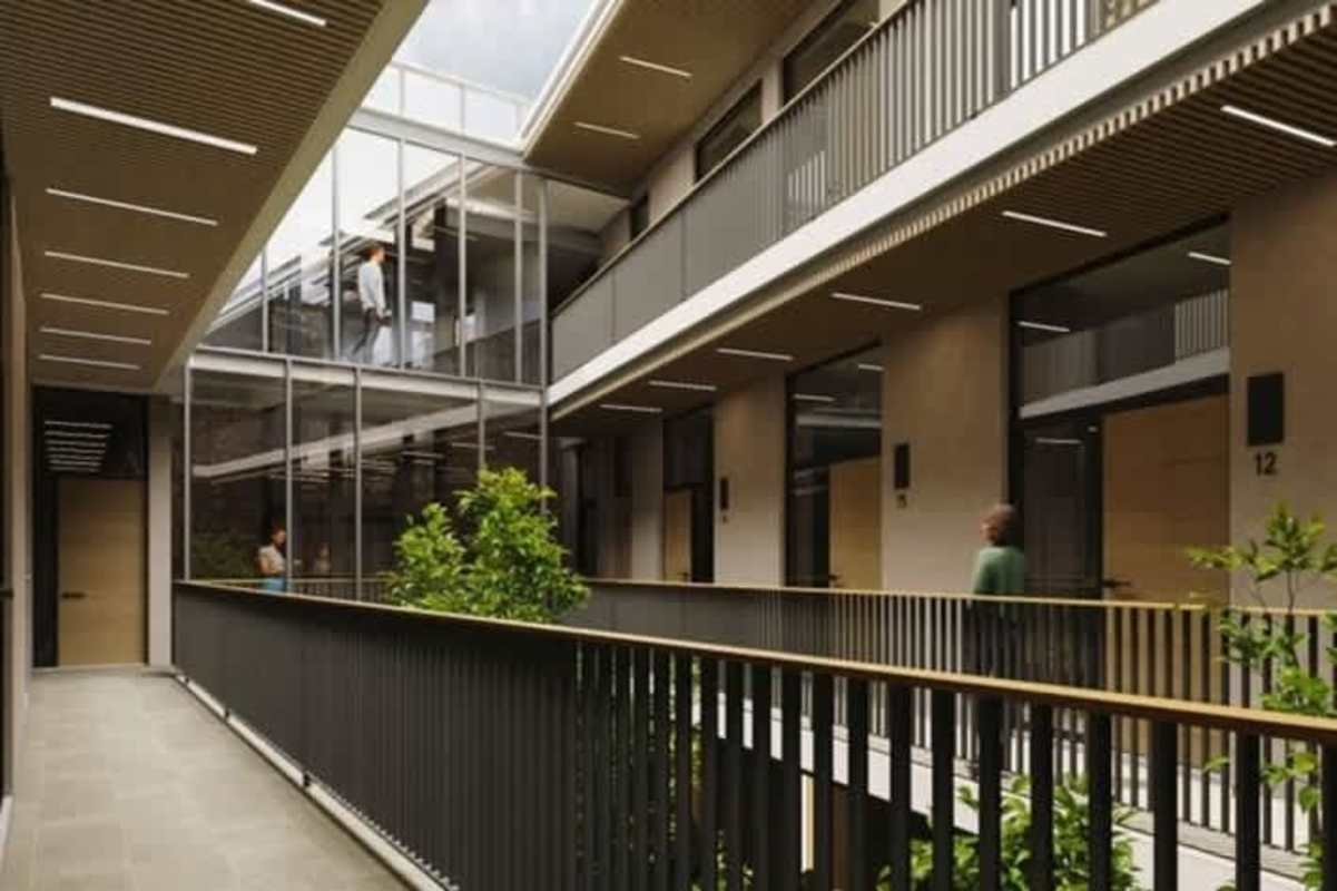 Open atrium with glass and plants in boutique Casco Viejo residence Panama