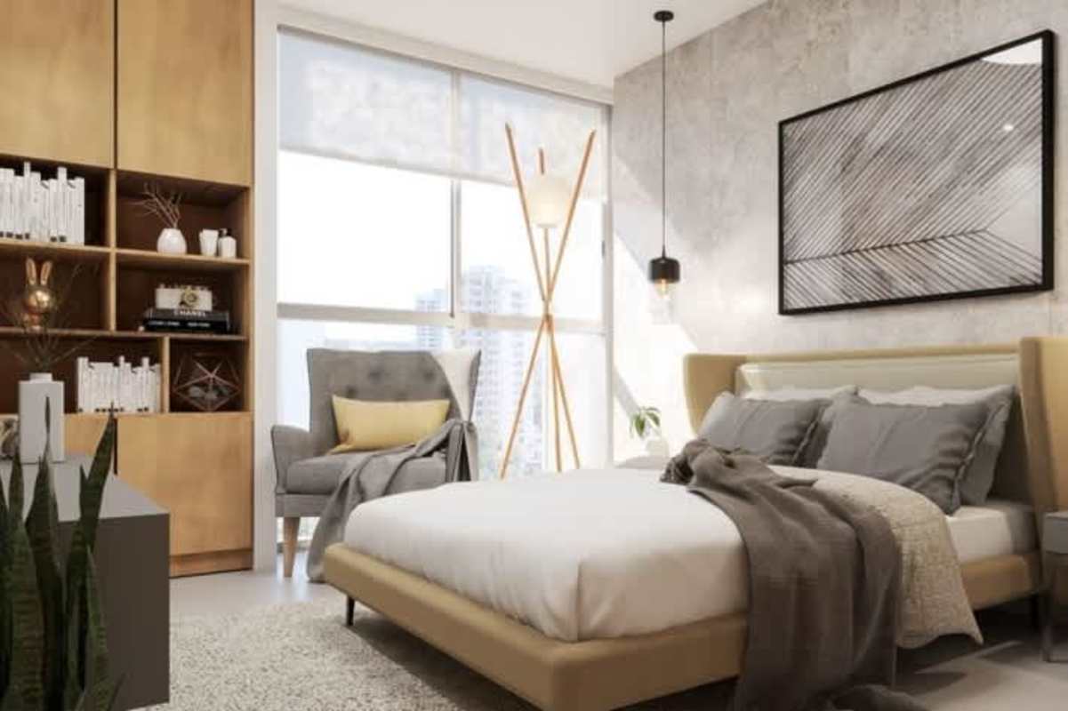 Modern kitchen with sleek cabinetry, marble countertops and appliances in Panama City oceanfront apartment