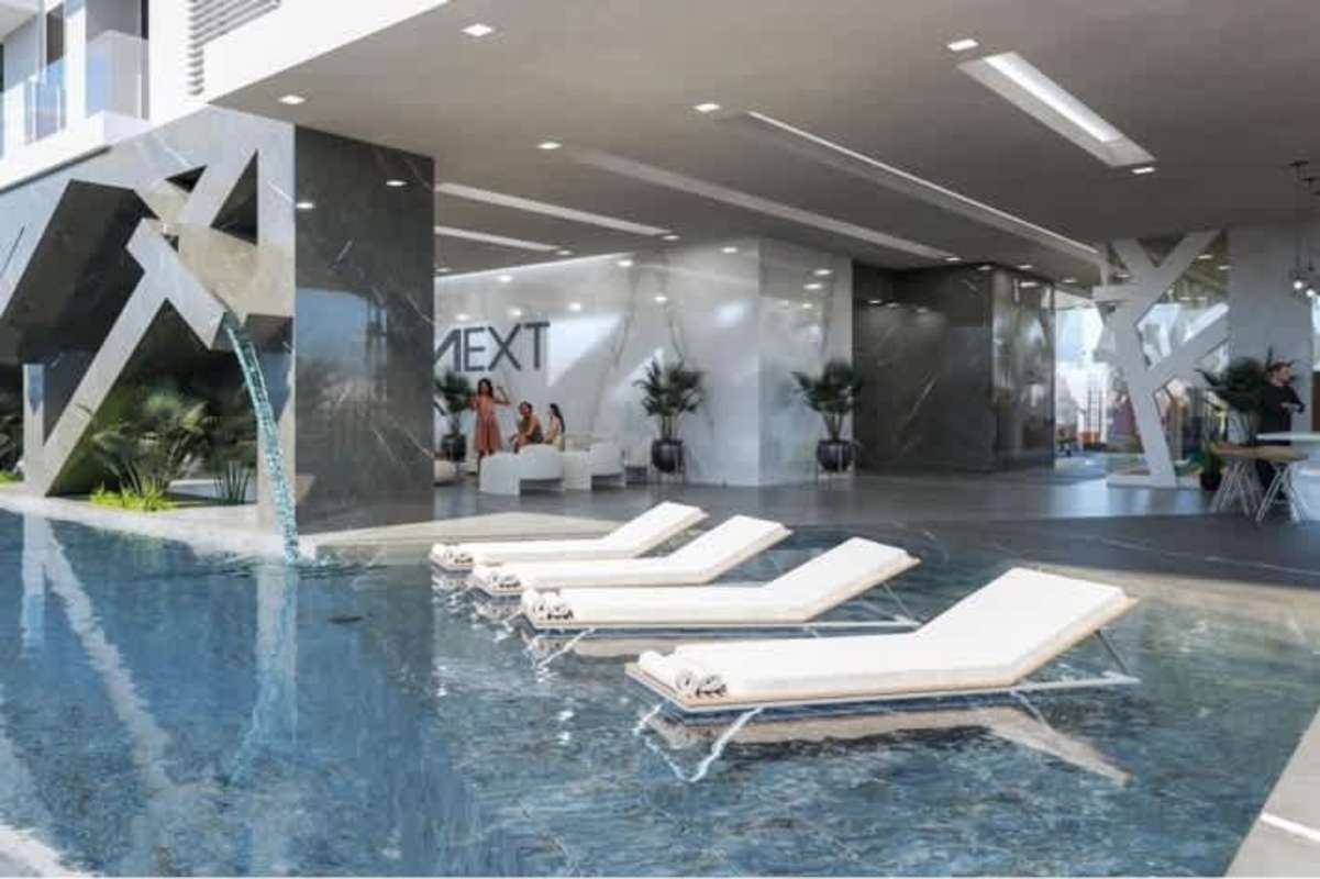 Outdoor kid's playground and dog park in Panama City's Coco del Mar luxury apartment building amenities