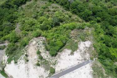 Sloped undeveloped terrain in secure beach community Panama