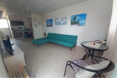 Compact kitchen with appliances and breakfast counter in Residencial Palo Alto Penonomé