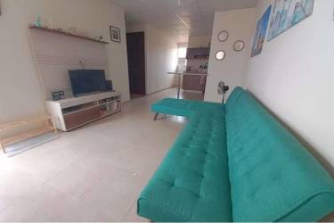 Kitchen with tile floor, cabinets, stove, and breakfast bar in Residencial Palo Alto Penonomé