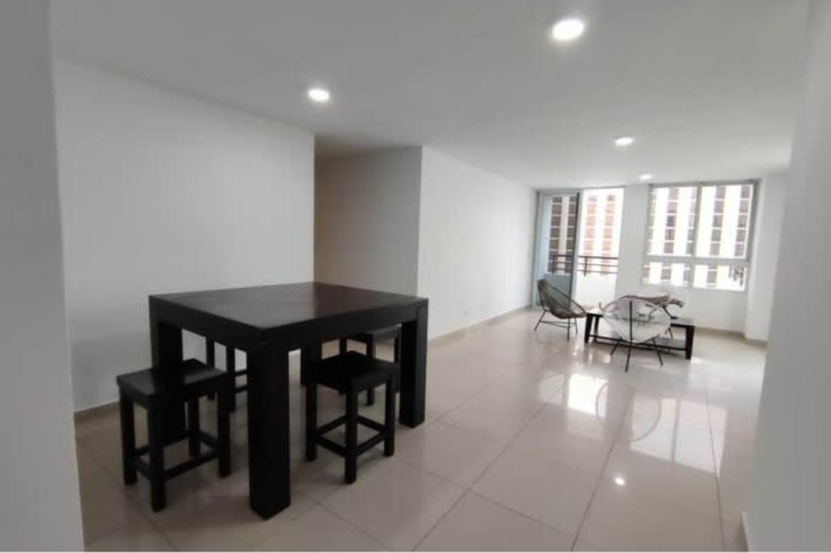 Kitchen with granite countertop, wood cabinetry, tile backsplash, window PH Sky Blue San Francisco Panama
