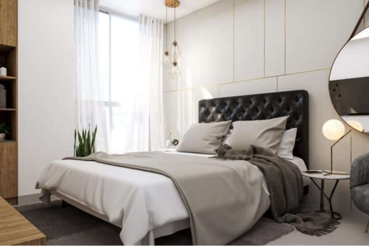 Spacious bedroom with tufted headboard, pendant lights, large window overlooking city at PH Next Tower Coco del Mar Panama