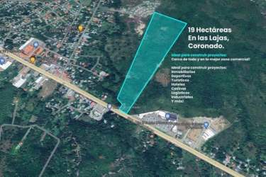 Aerial highlighted 19 hectare land parcel beside commercial area Interamerican Highway in Coronado Panama
