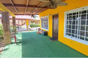 Kitchen with granite island, stove and cabinetry in Nueva Gorgona country house Chame Panama