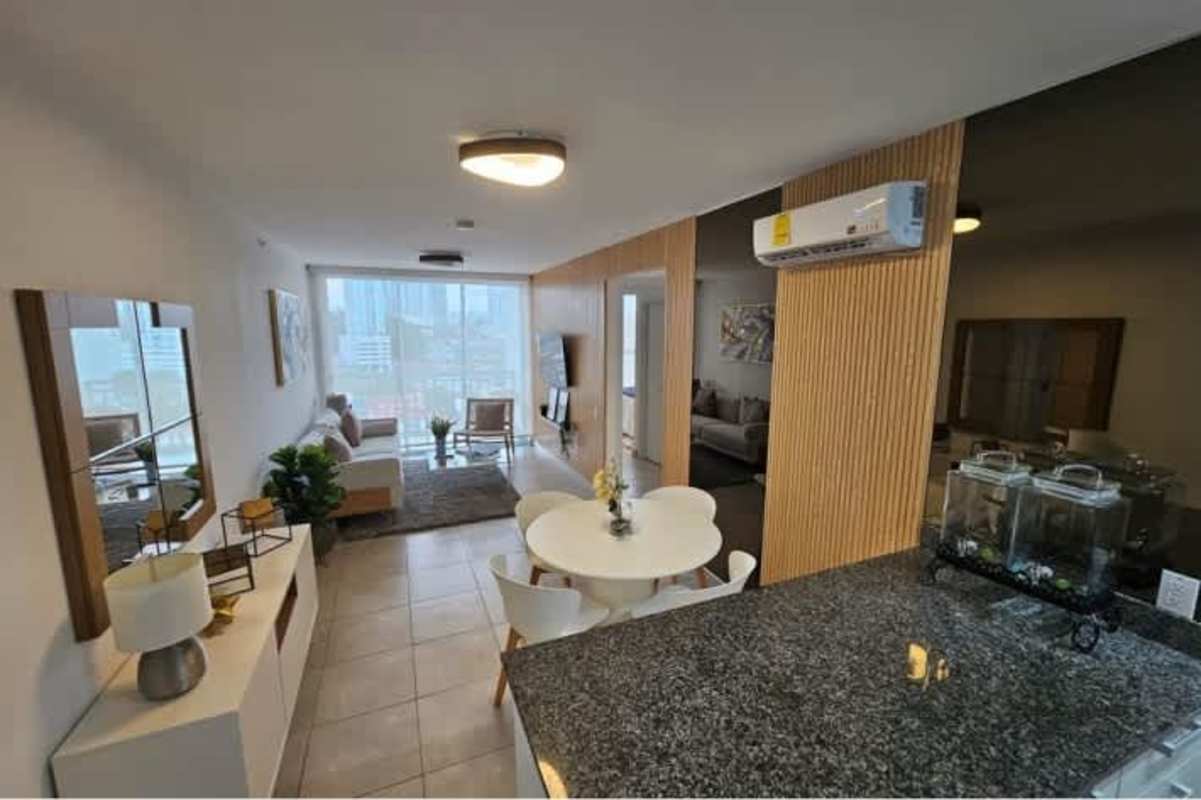 Bedroom featuring built-in closet, large window with skyline view in PH Via España One Panama City