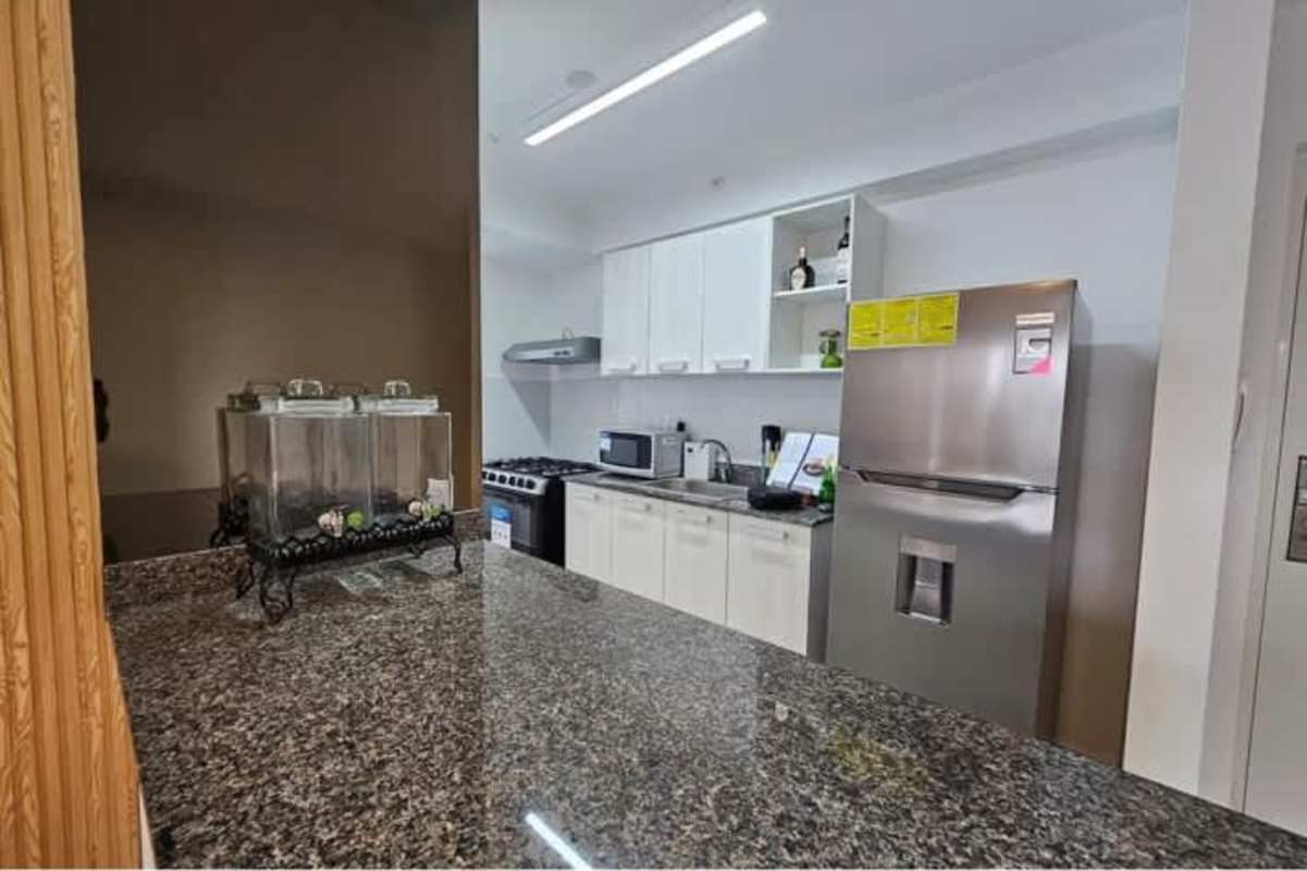 Modern bathroom with walk-in glass shower in PH Via España One Panama City