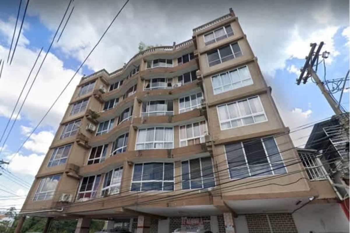 Interior storage room filled with packed furniture and boxes in commercial space in Panama
