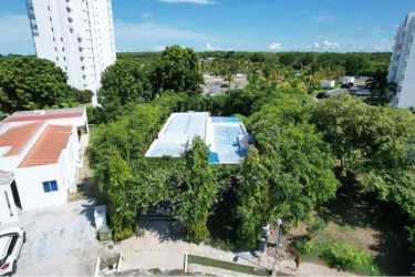 Contemporary house exterior with tropical greenery Napa Village Playa Blanca Panama