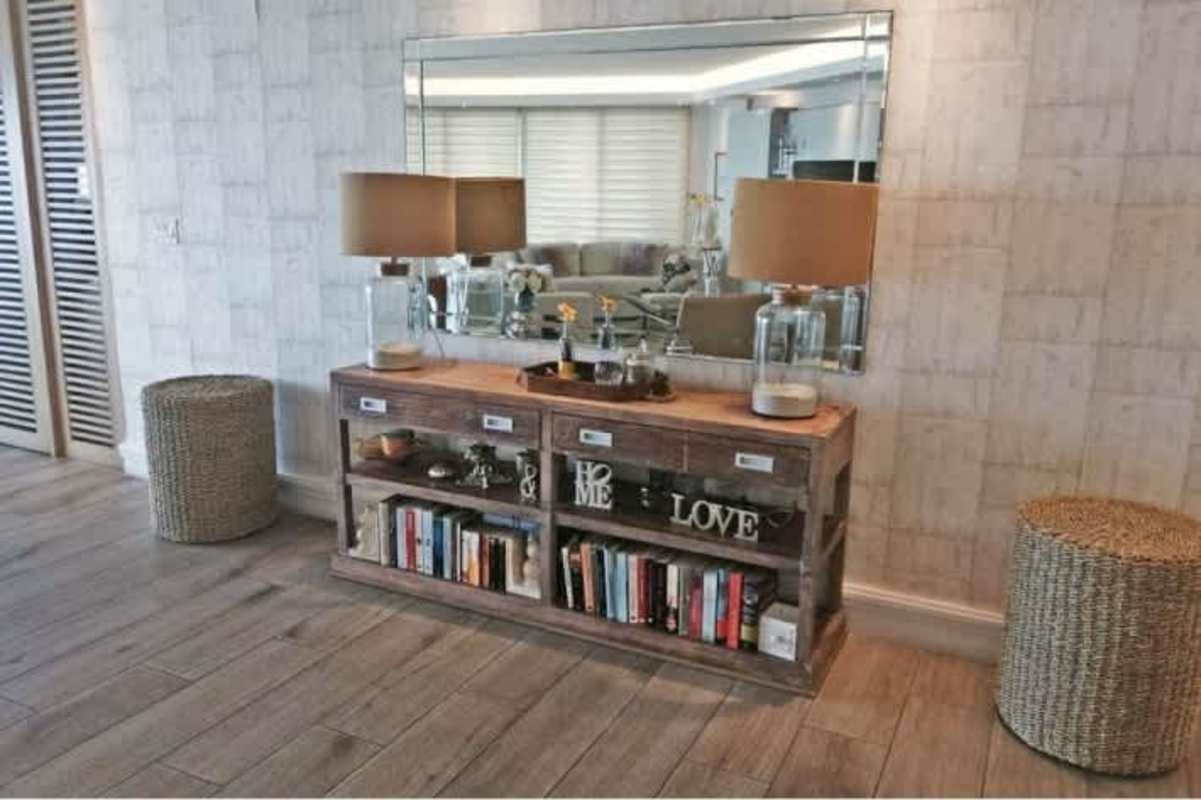 Large L-shaped balcony with panoramic ocean and city views at Oasis on the Bay Panama