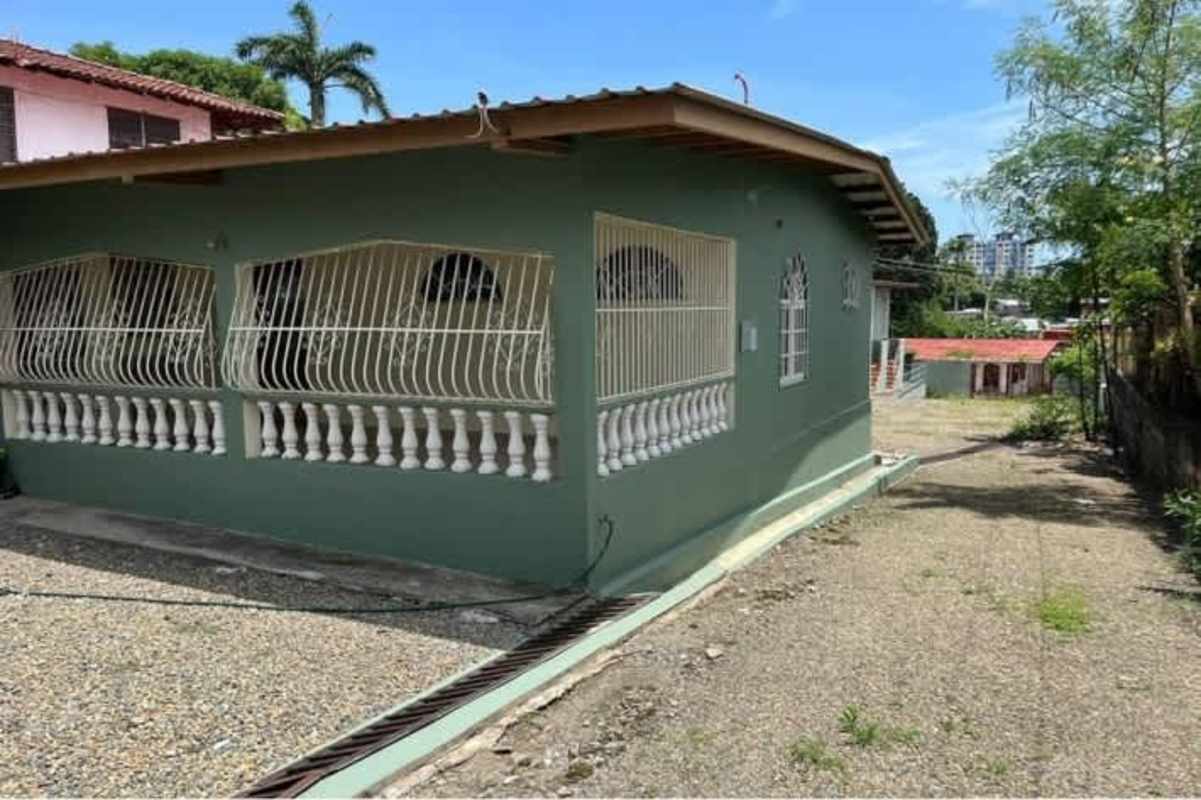 Side exterior view apartments with green facade in income property Juan Díaz Panama