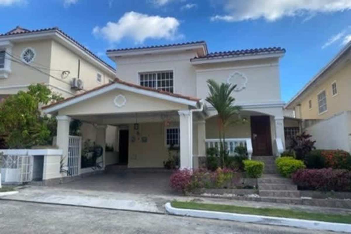 Two-level Mediterranean style house with carport in gated community Altos de Panamá