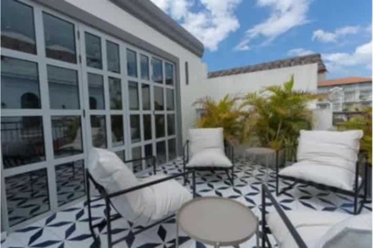 Restored colonial building facade with French balconies Casco Viejo Panama
