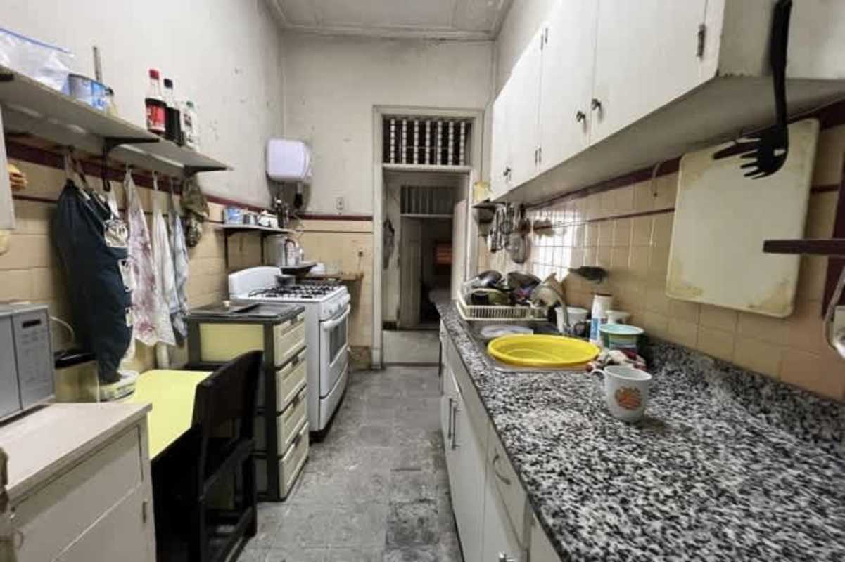 Outdoor patio with terracotta tiles, covered seating area, fenced commercial house Panama