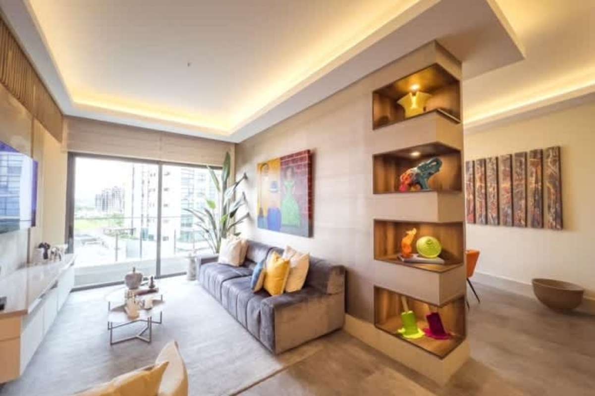 Contemporary dining room with large windows in luxury Santa María Golf condo Panama City