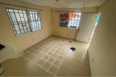 Simple bathroom with walk-in shower ceramic tiles affordable house Villas del Llano Penonomé