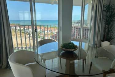 Dining area with stunning ocean view and contemporary design in penthouse PH Puntarenas Panama
