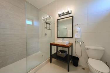 Modern furnished living dining area with full Pacific views Solaris Punta Caelo Panama