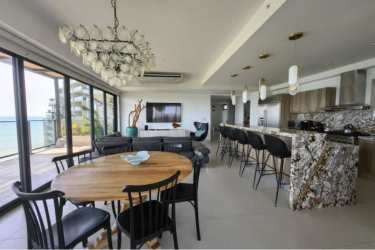 Renovated luxury kitchen with granite island at Solaris beach condo Panama