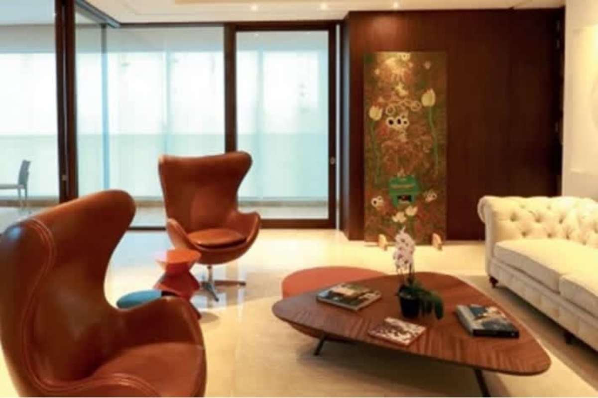 Spacious living room with floor-to-ceiling windows and modern decor in PH The Reserve luxury apartment Panama