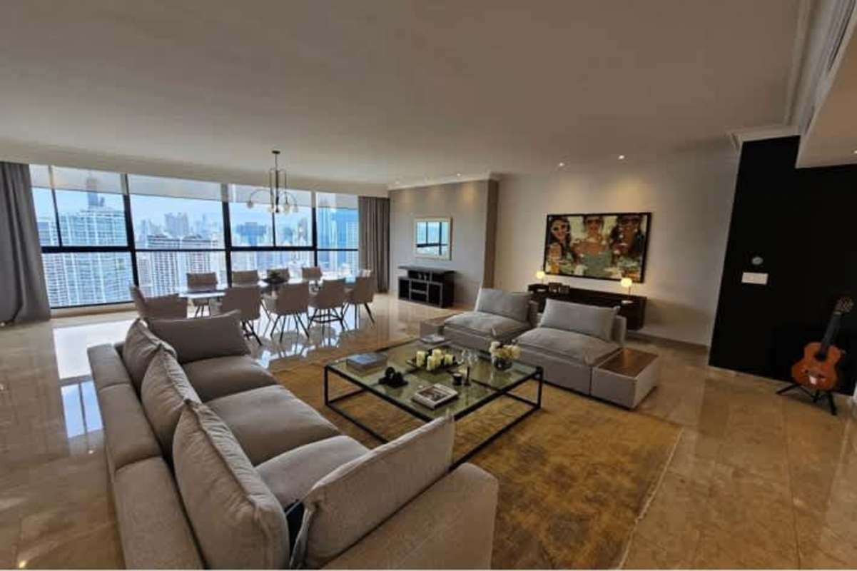 Bright kitchen with mosaic backsplash granite countertops stainless steel appliances Golden Palace Punta Paitilla Panama