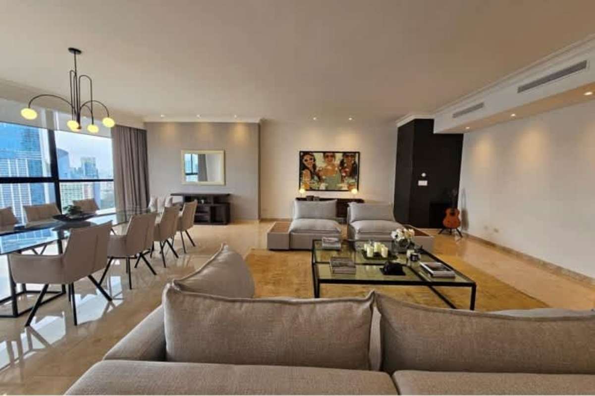 Elegant dining room floor to ceiling windows panoramic ocean views marble flooring Golden Palace Punta Paitilla Panama City