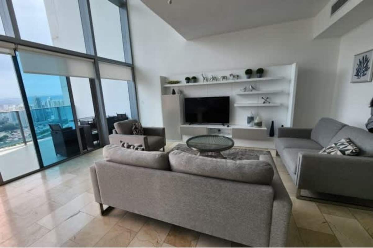 Modern kitchen with granite counters, stainless steel appliances at luxury Pacific Point Panama apartment