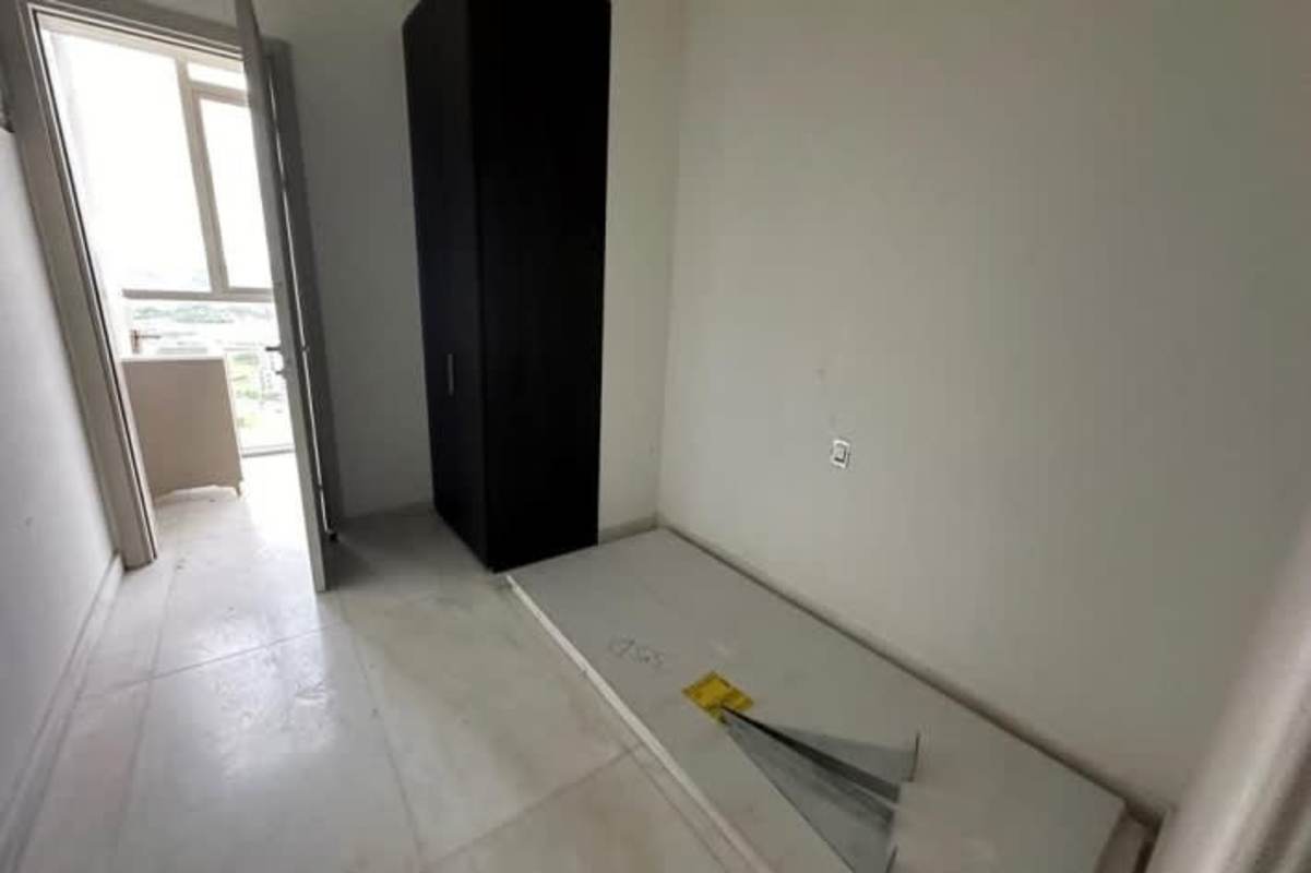 Modern Italian kitchen featuring marble countertops island panoramic views Fendi Casa Panama City