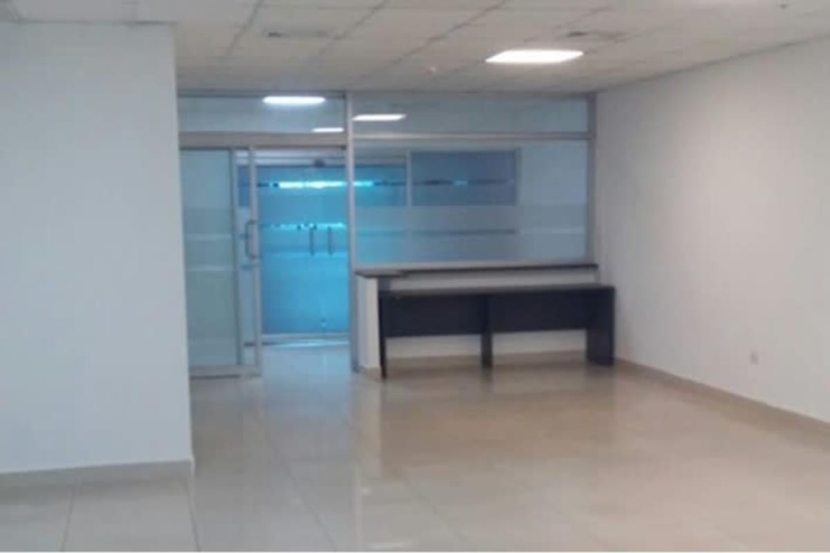 Commercial office bathroom with framed mirror and modern fixtures at PH BICSA Financial Center Panama