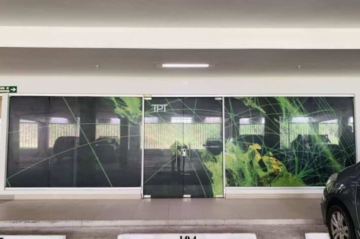 Parking garage with green design glass doors at Terrazas de Albrook Panama