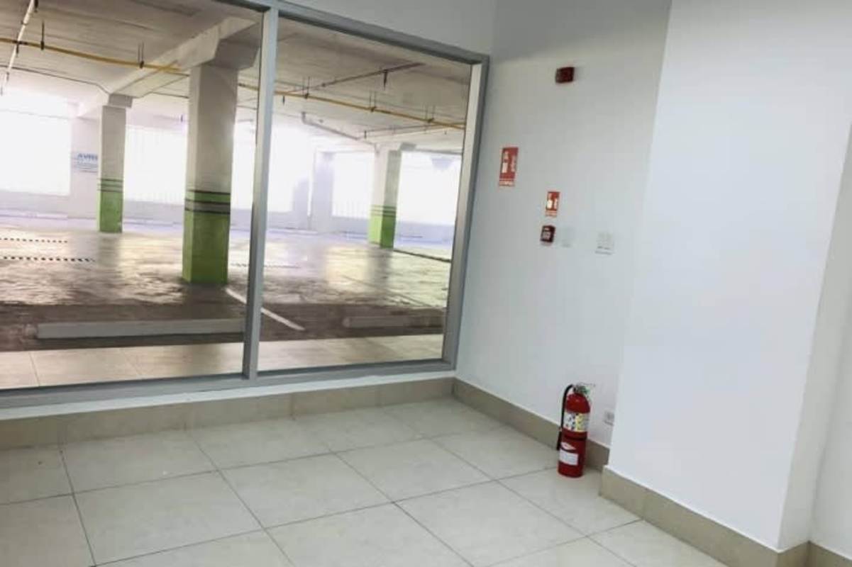Lobby with window overlooking parking inside Terrazas de Albrook Panama