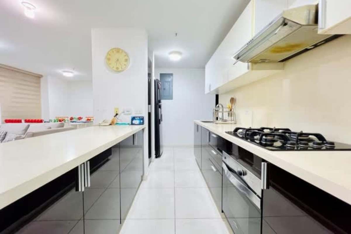 Flexible living area with TV, AC and workspace in apartment rental at Villa Lucre Panama