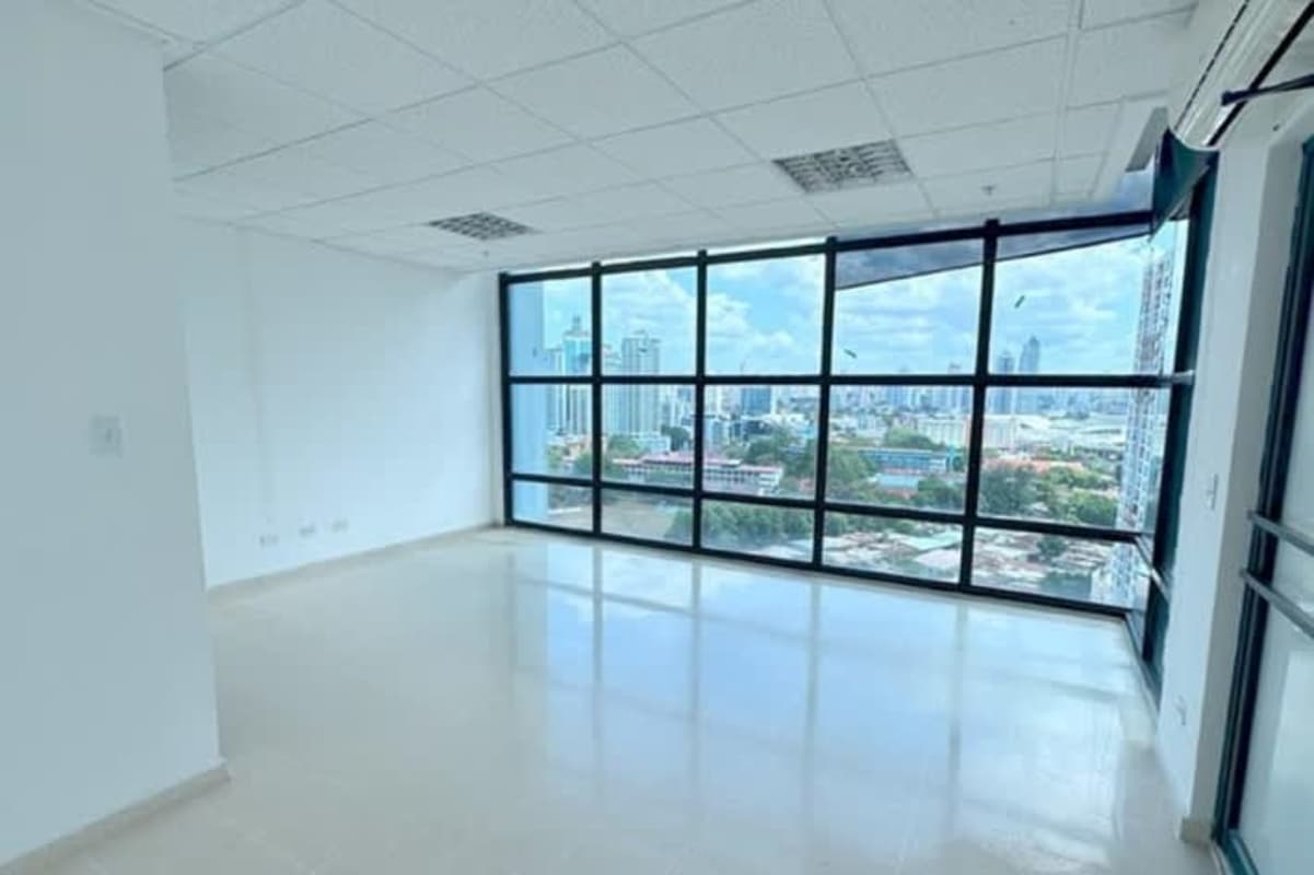 Spacious modern office interior with glass doors and Pacific Ocean views in Punta Paitilla