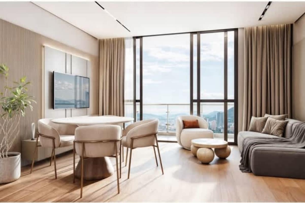 Open-plan living dining and kitchen in new Marbella Panama apartment with balcony views