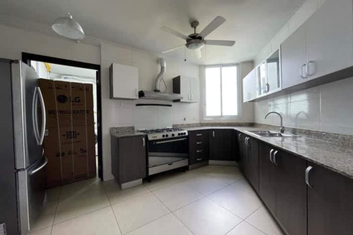 Elegant dining area open-plan luxury apartment marble floors Costa del Este Panama