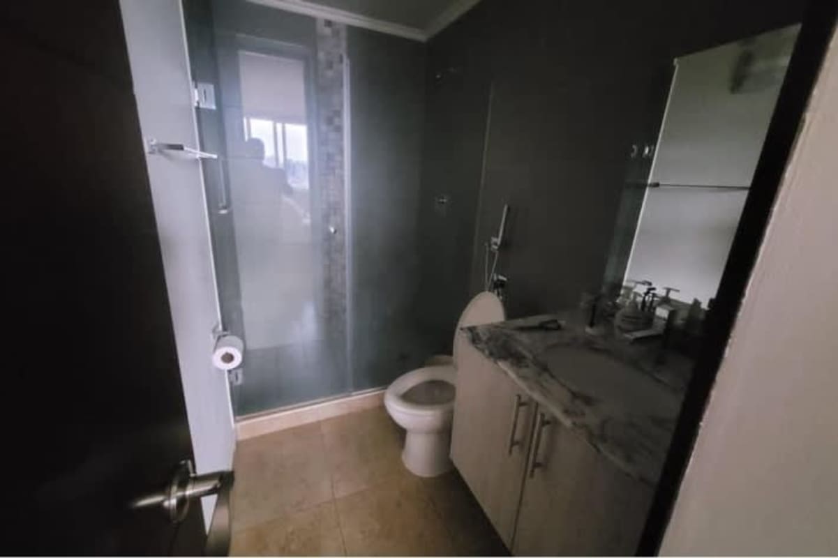 Master bedroom with large window city view split AC PH Sky Pueblo Nuevo Panama City